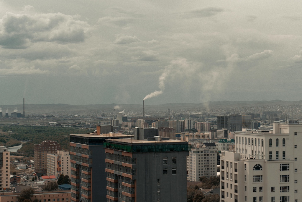 polluted air above a city buildings