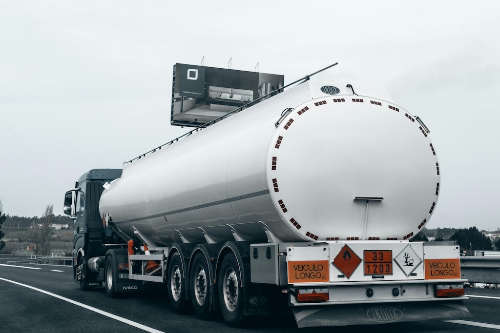tanker-truck-on-highway-transporting-fuel tanker truck on highway transporting fuel