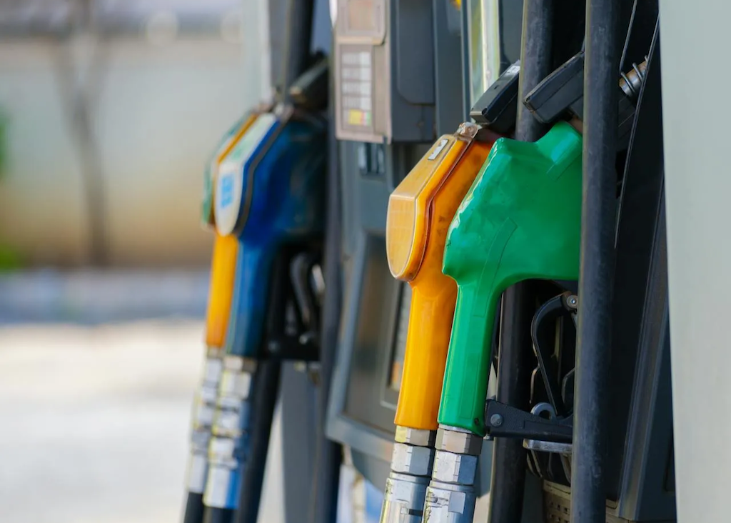 gasoline pumps in close up photography