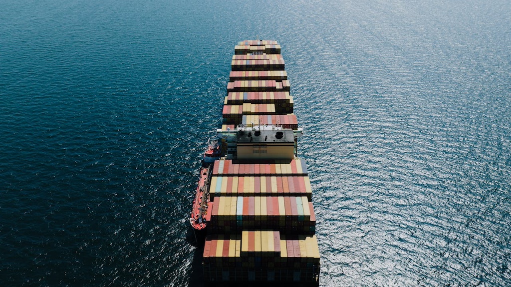fully-loaded-cargo-ship-on-a-sea fully loaded cargo ship on a sea