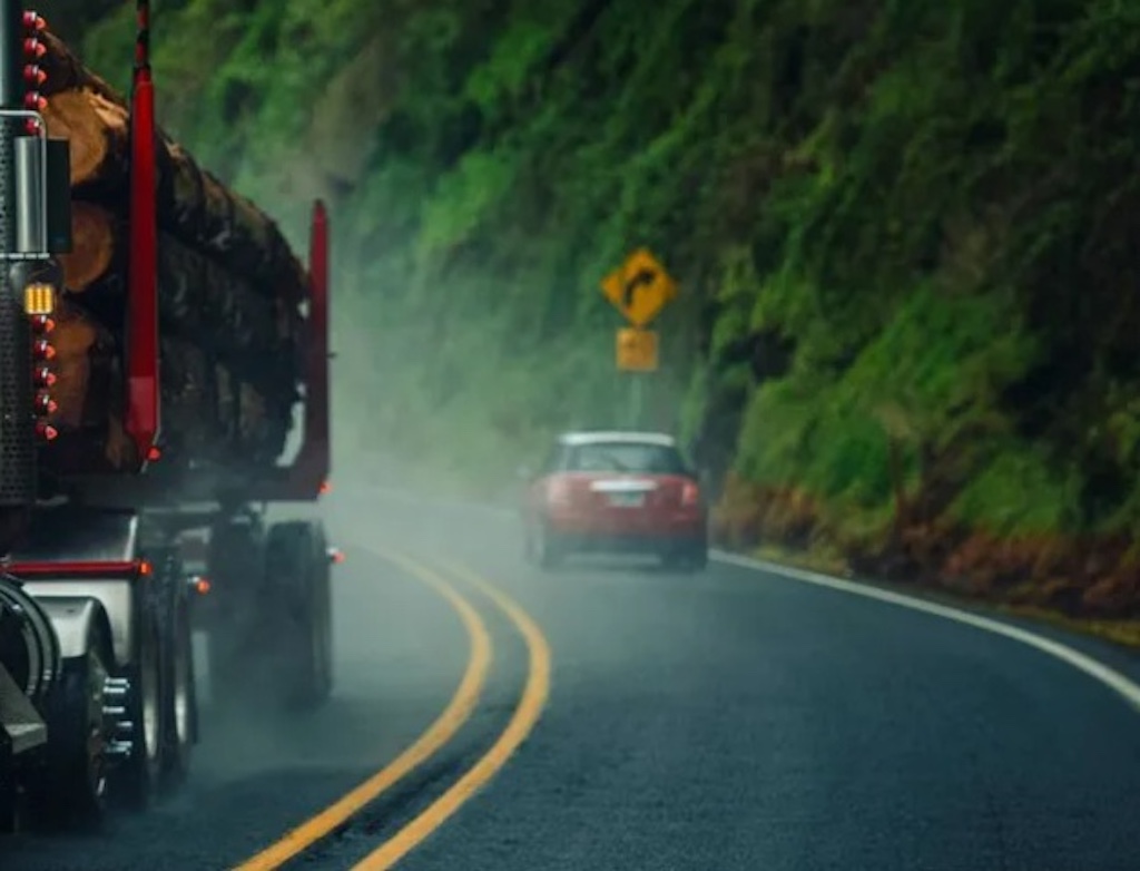 red semi truck on scenic oregon highway