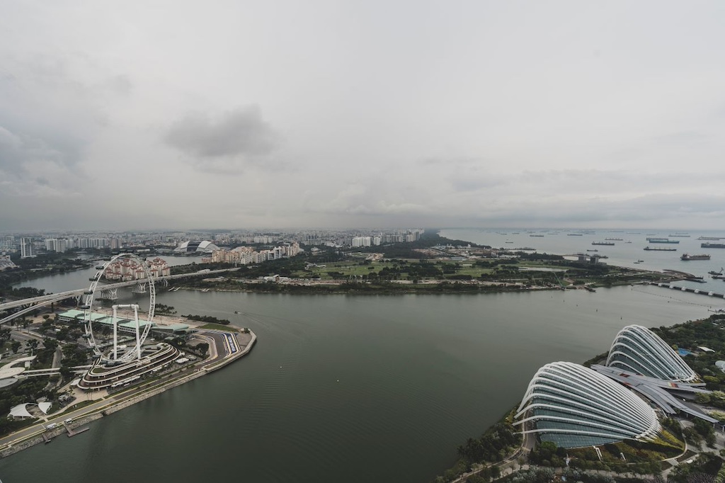 City and River under Overcast Sky